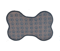 brown coloured dog food mat with paw print