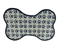 grey coloured dog food mat with paw print